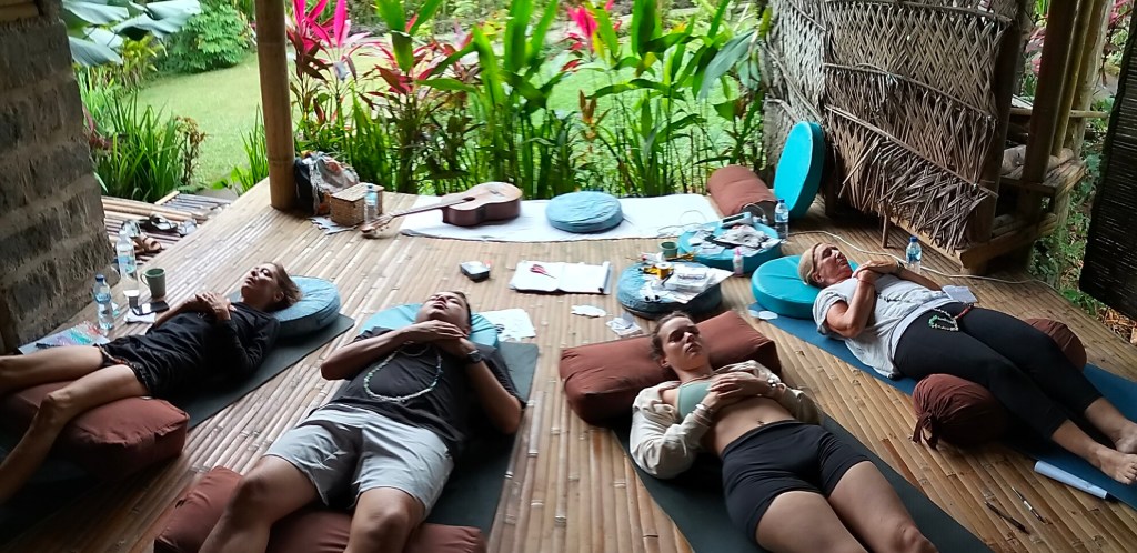 Participants deeply relaxing listening to a magical sound healing experience by Jelila Sound Healer Ubud and Online.